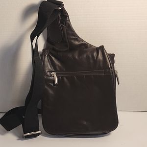 Travelon- brown leather expandable sling- unisex